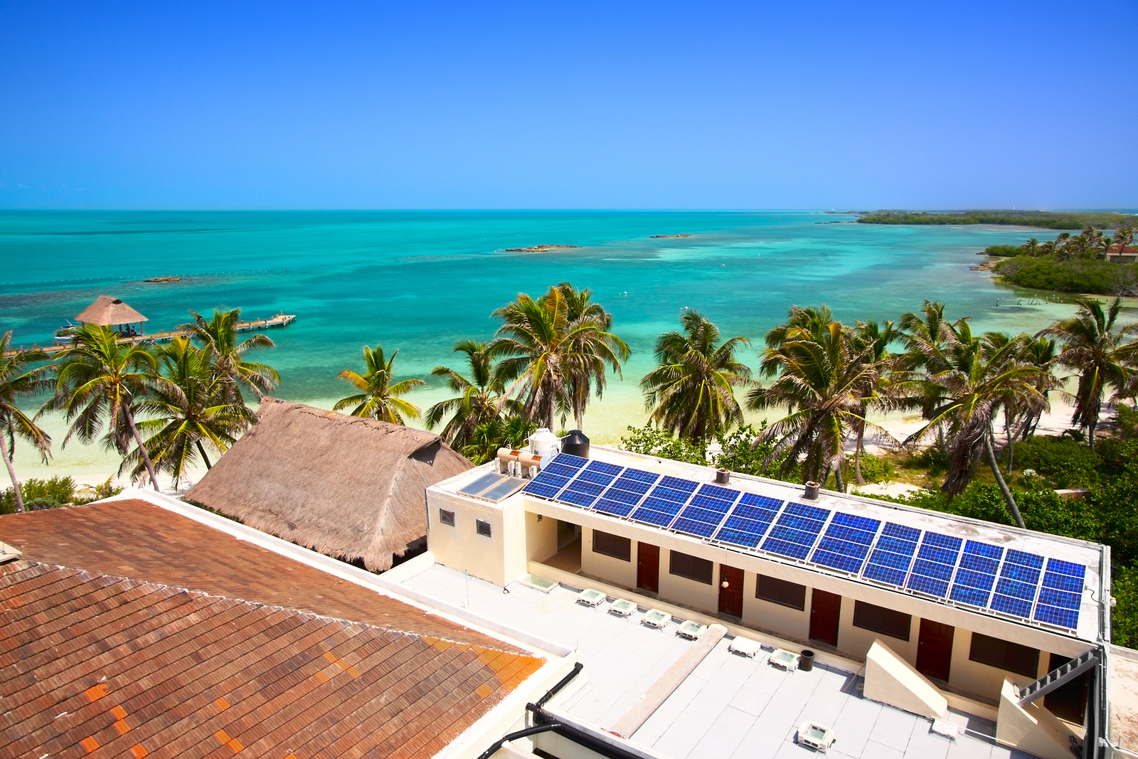 Aerial view on the beach with a building with a solar panel on the Isla Contoy, Mexico.