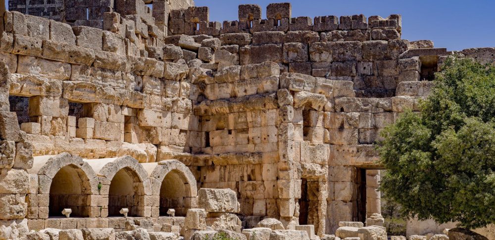 The complex of temples at Baalbek is located at the foot of the south-west slope of Anti-Lebanon, bordering the fertile plain of the Bekaa at an altitude of 1150 m.