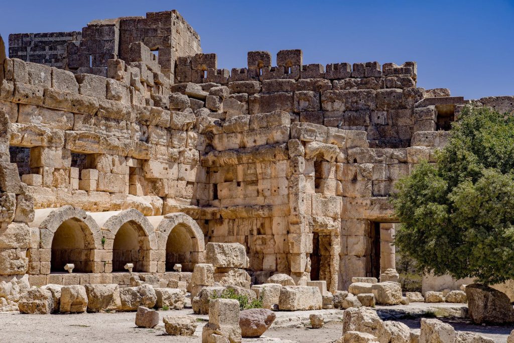 The complex of temples at Baalbek is located at the foot of the south-west slope of Anti-Lebanon, bordering the fertile plain of the Bekaa at an altitude of 1150 m.