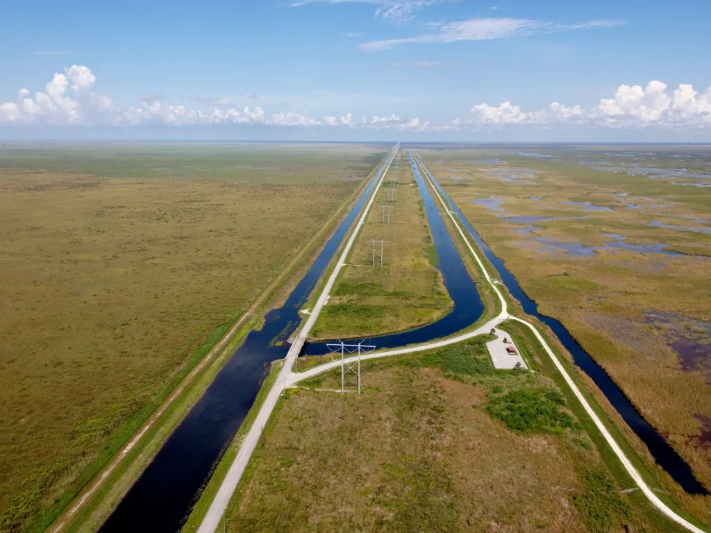 Aerial view of Everglades National Park with a highway intersecting the park.
