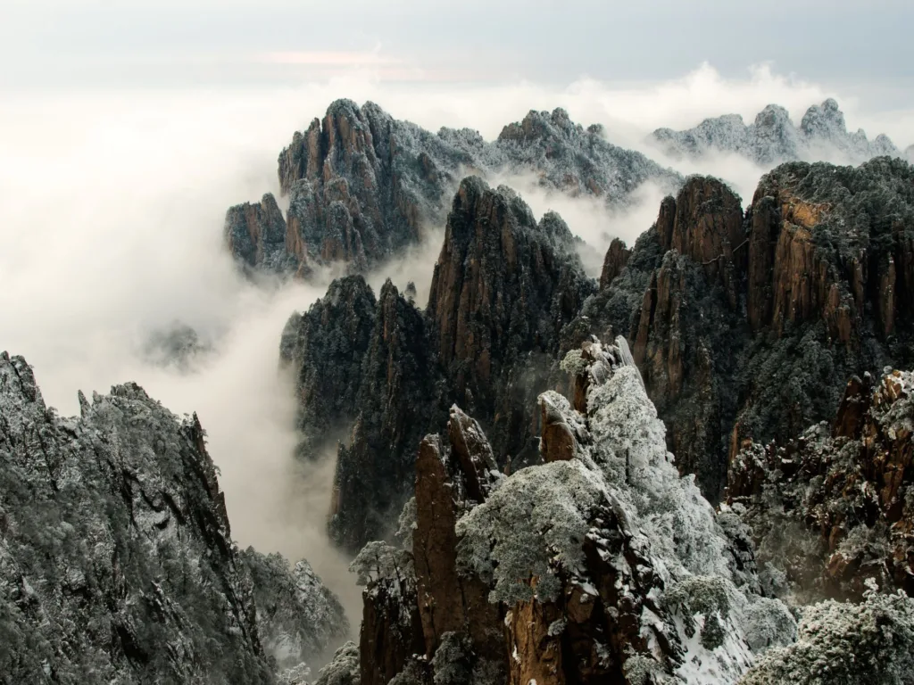 A misty view of the jagged peaks of Huangshan Mountains, China.  