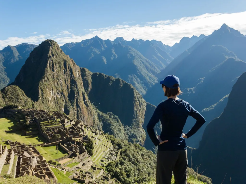 A hiker overlooks Machu Picchu, Peru.